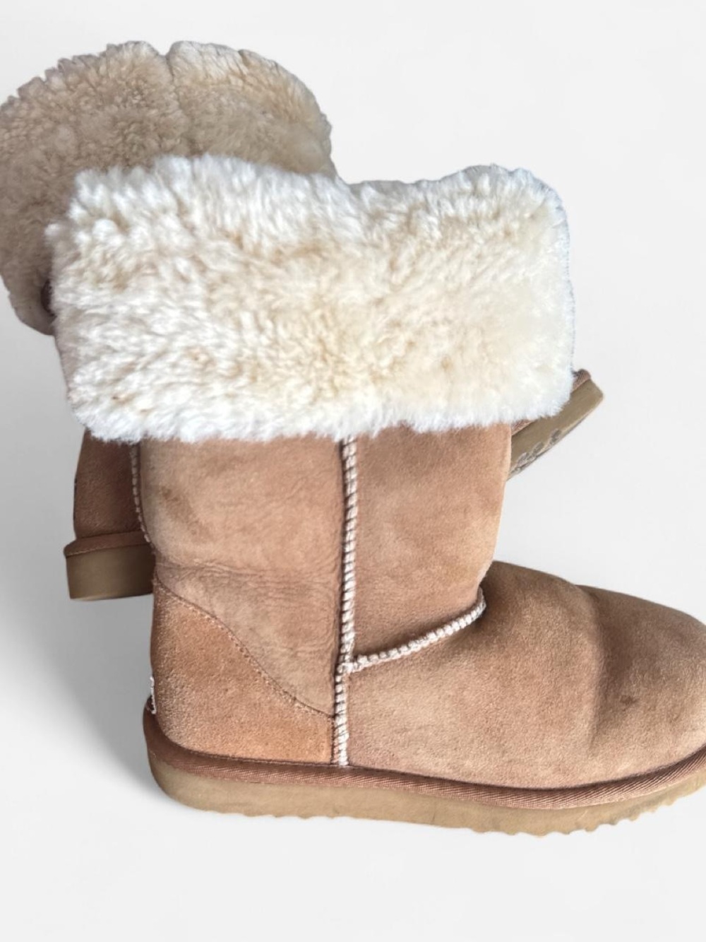 Uggs small stains all around women’s size 7Shearling-Lined Suede - Tan